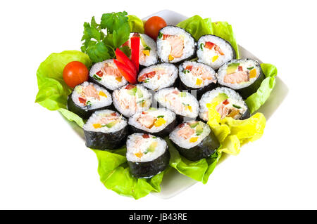 Decorated plate of sushi isolated on white background with clipping path Stock Photo