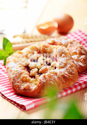 Danish pastry with jam and crumb topping Stock Photo