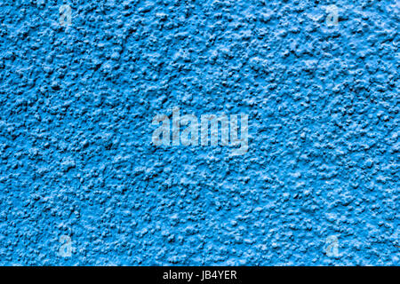 Abstract deep blue wall plastered texture. Rustic background. Stock Photo