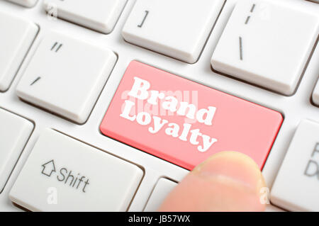 Pressing brand loyalty key on keyboard Stock Photo