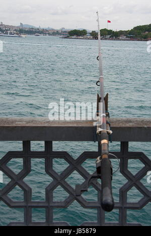 The taste of fishing on the galata bridge. While watching Istanbul bosphorus Stock Photo