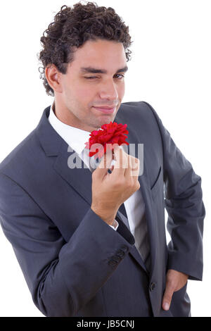 handsome seducer in suit with rose Stock Photo