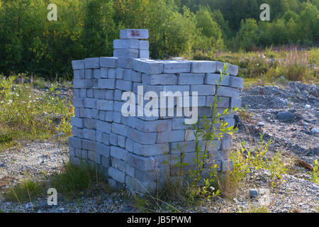 A stack of grey bricks for construction Stock Photo