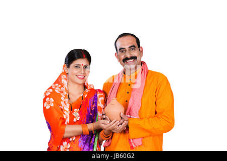Happy 2 Indian Rural Married Couple Standing Together Holding Piggy Bank Saving Money Future Planning Stock Photo
