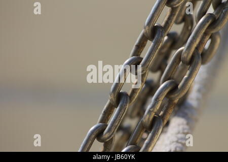 Chains and line bound to life boat on ferry Stock Photo