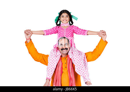 Indian Rural Farmer Father Carrying Little Daughter on His shoulders Happy Smiling Enjoy Stock Photo