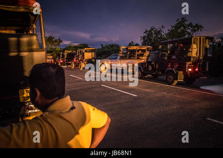 Jeeps waiting for the Yala National Park to open in the morning - Sri Lanka Stock Photo