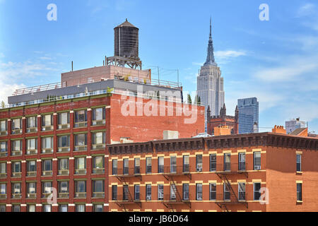 Rooftop water tank on a New York apartment building, USA. Stock Photo