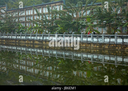 Reflection in pond at Bai Dinh Buddist Temple Complex, near Ninh Binh, Vietnam Stock Photo