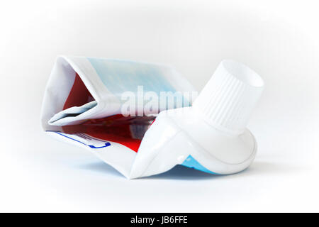The empty tube of toothpaste on a white background. Stock Photo