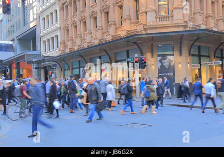 People cross street in downtown Sydney Australia Stock Photo