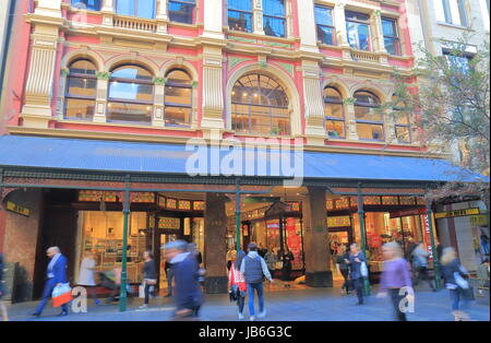 People visit Pitt street mall in Sydney Australia. Pitt street mall is a prehistorian street with department stores and shops in downtown Sydney. Stock Photo