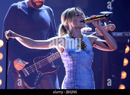 (ATTENTION EDITORS: EMBARGOED UNTIL 10 JULY 2017)     German pop singer Helene Fischer sings during the videotaping of the ZDF anniversary show of '1, 2 oder 3' (lit. 1, 2 or 3) in Cologne, Germany, 08 June 2017. Photo: Oliver Berg/dpa Stock Photo