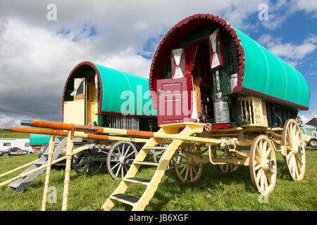 Appleby-in-Westmorland, U.K. 9th June 2017. Traditional bow top gypsy wagons  at the Appleby Horse Fair. The fair has existed since 1685 under the protection of a charter granted by King James II. Starting the first week in June and running for a week the fair is visited by Romany Gypsies, Horse Dealers and Travellers from across Europe. Credit: Mark Richardson/Alamy Live News Stock Photo