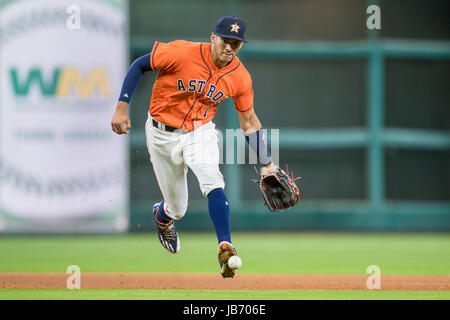 Houston, TX, USA. 9th June, 2017. Houston Astros shortstop Carlos Correa (1) fields the ball in the 4th inning during a Major League Baseball game between the Houston Astros and the Los Angeles Angels at Minute Maid Park in Houston, TX. Trask Smith/CSM/Alamy Live News Stock Photo