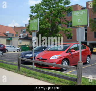 ANN ARBOR, MICHIGAN - JUNE 21: Zipcar, with cars available at locations such as the one shown here on June 21, 2013, was purchased by Avis in January 2013. Stock Photo