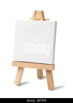 Small easel and canvas on white background Stock Photo