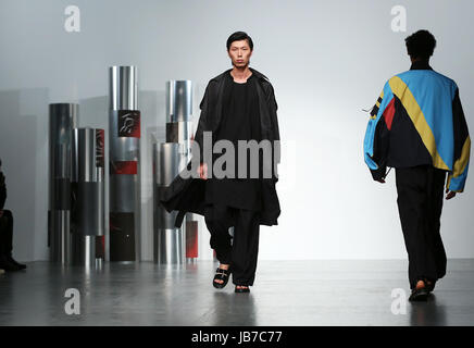 A model on the catwalk during the Berthold London Fashion Week Men's SS18 presentation held at the BFC Show Space PRESS ASSOCIATION Photo. Picture date: Friday 9th June, 2017. Photo credit should read: Isabel Infantes/PA Wire Stock Photo