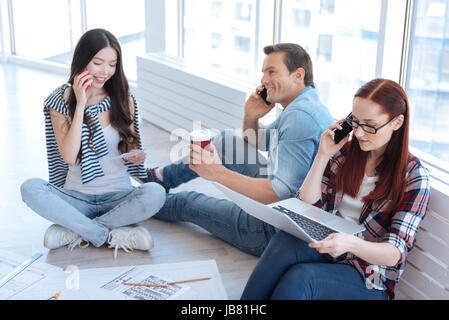 Nice young people speaking on the phone Stock Photo