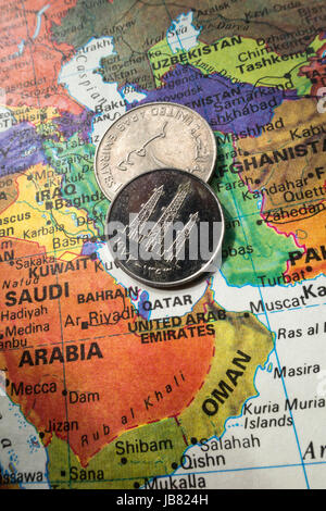 United Arab Emirates Coin on World Map Still Life Stock Photo