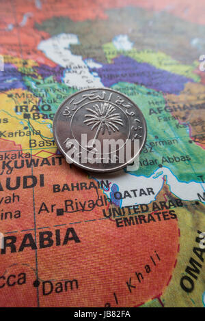 Bahrain Coin on World Map Still Life Stock Photo