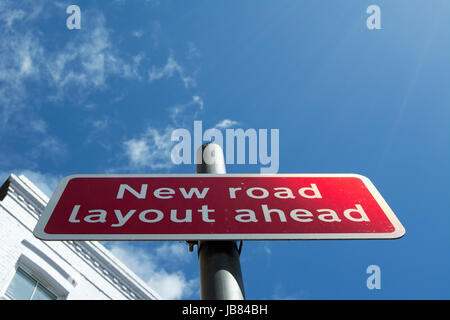 british road sign indicating a new road layout ahead, in kingston upon thames, surrey, england Stock Photo