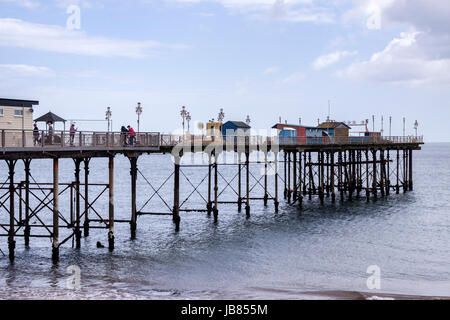Teignmouth Pier, only partially re-opened after the damage created in the storms of 2014. Stock Photo