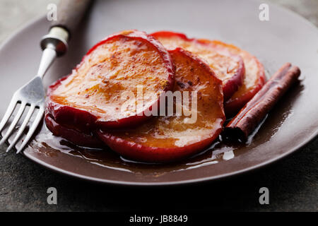 apples cooked with brown sugar, butter and cinnamon Stock Photo