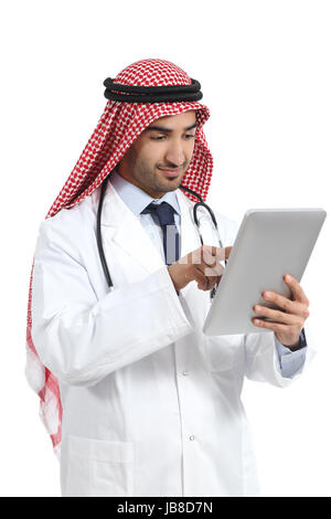 Arab saudi emirates doctor man browsing a digital tablet isolated on a white background Stock Photo