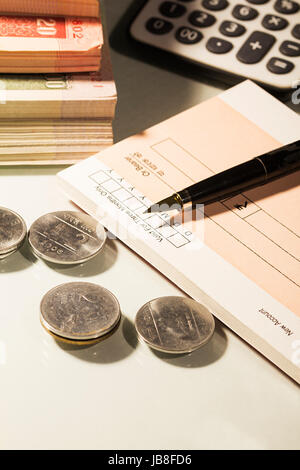 Cheque Book Pen Money Coins Cash Stock Photo