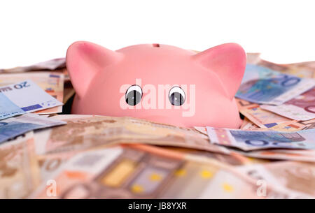 Unique pink ceramic piggy bank drowning in money, isolated on white Stock Photo