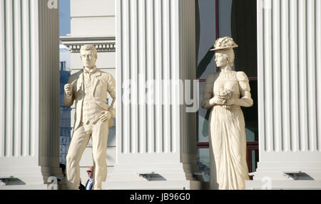Skopje, Macedonia - january 23, 2013:Statues of a man and woman on newly opened buiding of Macedonia's Foreign Affairs Ministry in capital Skopje,imag Stock Photo