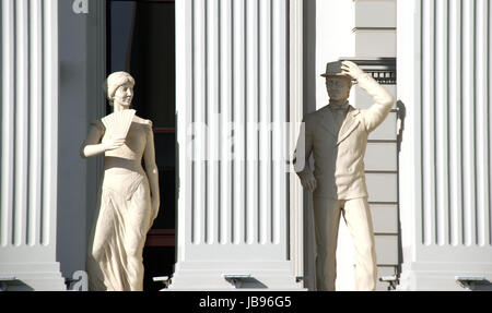 Skopje, Macedonia - january 23, 2013:Statues of a man and woman on newly opened buiding of Macedonia's Foreign Affairs Ministry in capital Skopje,imag Stock Photo