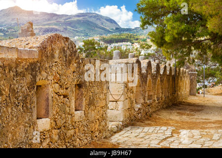 Inner courtyard & fortifications, surrounded by stone walls, Fortezza Castle - Venetian fortress with Bastion defense system on hill Paleokastro in re Stock Photo