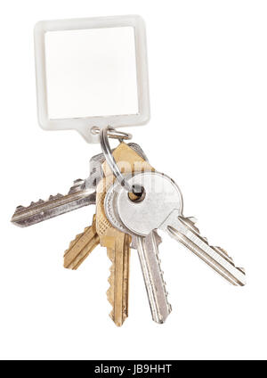 bunch of door keys on ring and keychain isolated on white background Stock Photo