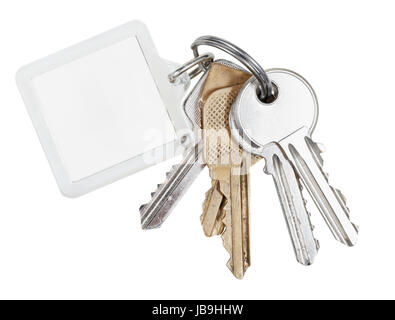 several door keys on ring and keychain isolated on white background Stock Photo