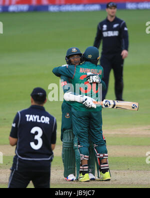 Bangladesh's Shakib Al Hasan (left) is congratulated by Mahmudullah after reaching his century during the ICC Champions Trophy, Group A match at Sophia Gardens, Cardiff. Stock Photo