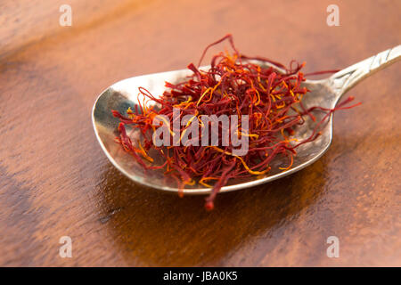 stigmas of saffron in spoon Stock Photo