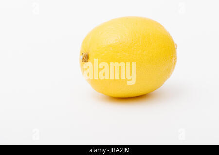 Photo of a juicy lemon. Photo on a light background. Copy space. Paste ...