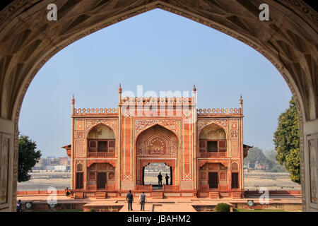 Entrance gate seen from interior of Itimad-ud-Daulah Mausoleum in Agra, Uttar Pradesh, India. This Tomb is often regarded as a draft of the Taj Mahal. Stock Photo