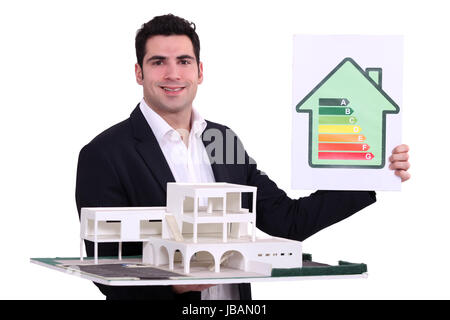 Architect with an energy rating sign Stock Photo