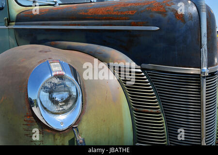 Close up of a weathered 1940 Ford Deluxe sedan off of Route 66 in Stauton Illinois. Stock Photo