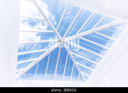 Large window on the ceiling, great transparent glass on the roof in luxury apartment, modern architecture, luxurious contemporary construction creative design concept Stock Photo