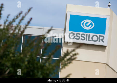 A logo sign outside of the headquarters of Essilor of America in Dallas, Texas, on May 29, 2017. Stock Photo