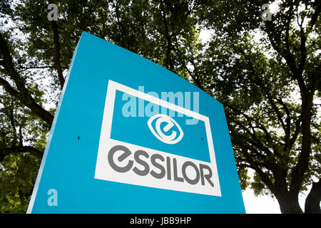 A logo sign outside of the headquarters of Essilor of America in Dallas, Texas, on May 29, 2017. Stock Photo