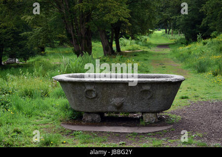 Carved Roman domestic bath in the grounds of Lowther Castle UK Stock Photo