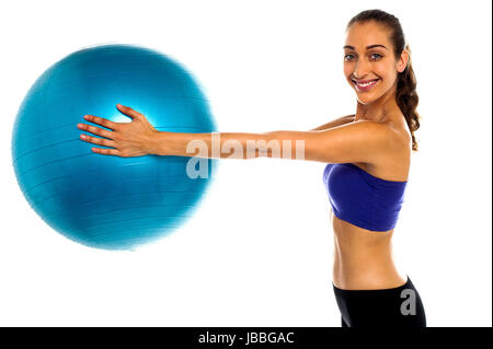 Fitness enthusiast. Portrait of a beautiful woman stretching