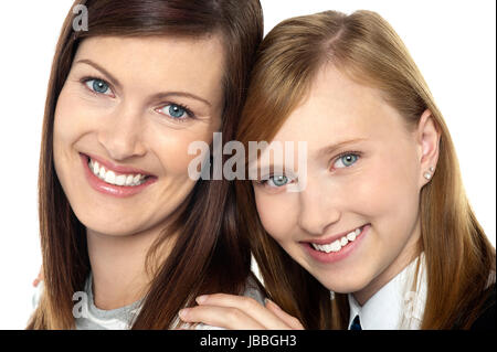 Closeup of mom and daughter flashing a smile Stock Photo - Alamy