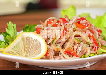 Fresh salad with funchozy, meat and vegetables Stock Photo