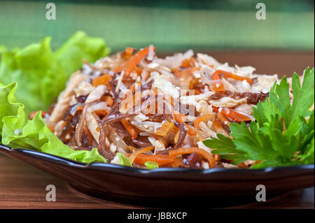 Fresh salad with funchozy, meat and vegetables Stock Photo